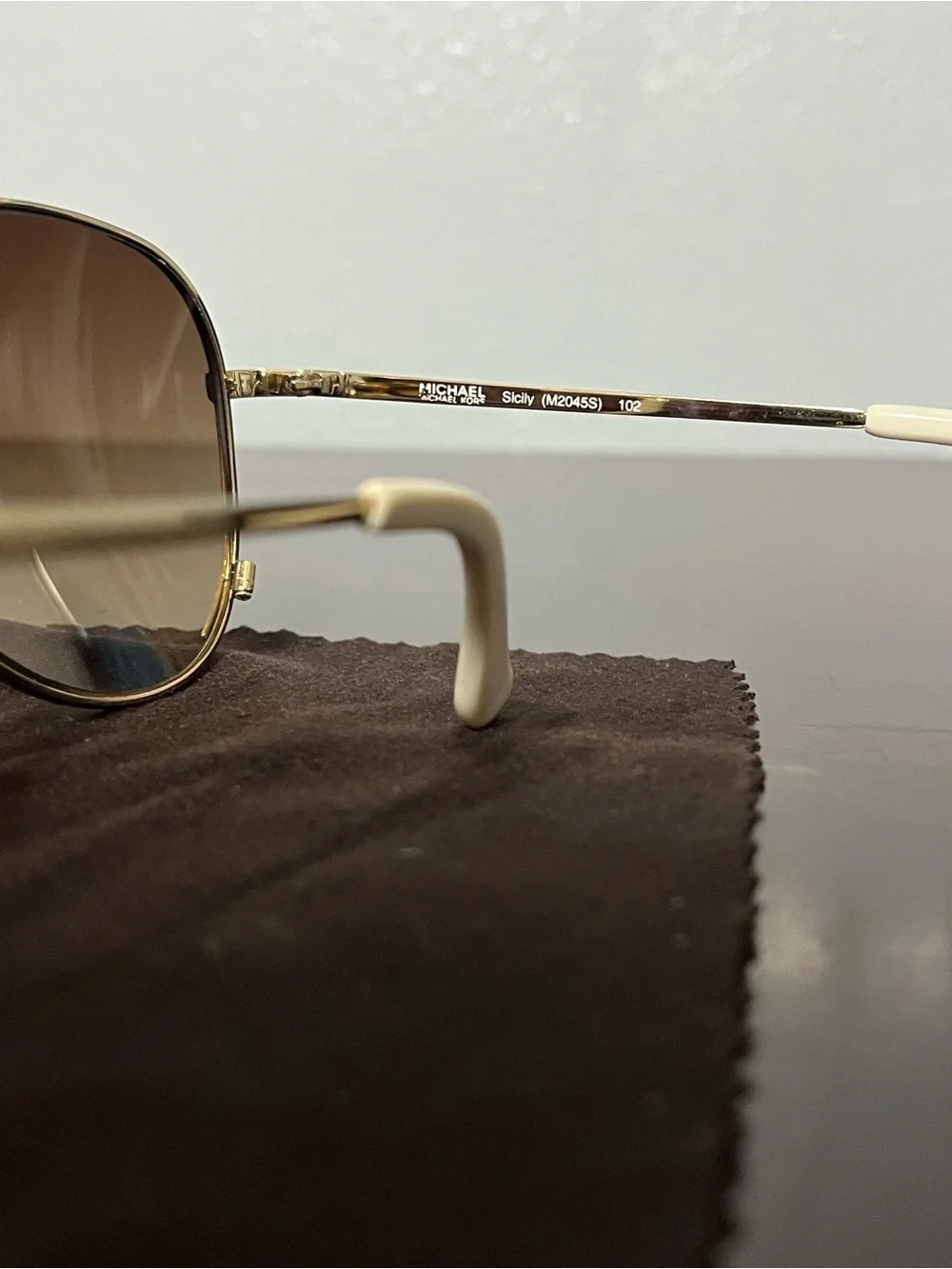 Michael Kors Gold Aviator Sunglasses with Gradient Black Lenses